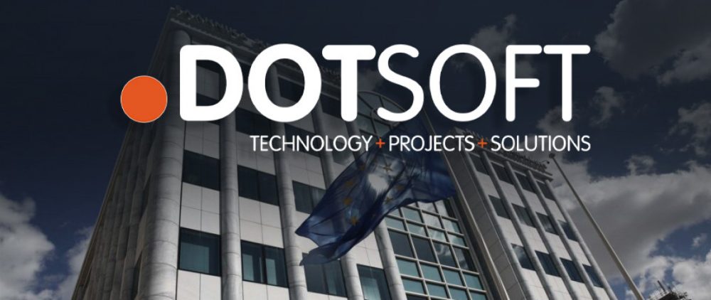 The Dotsoft logo over an office building with a European Union flag